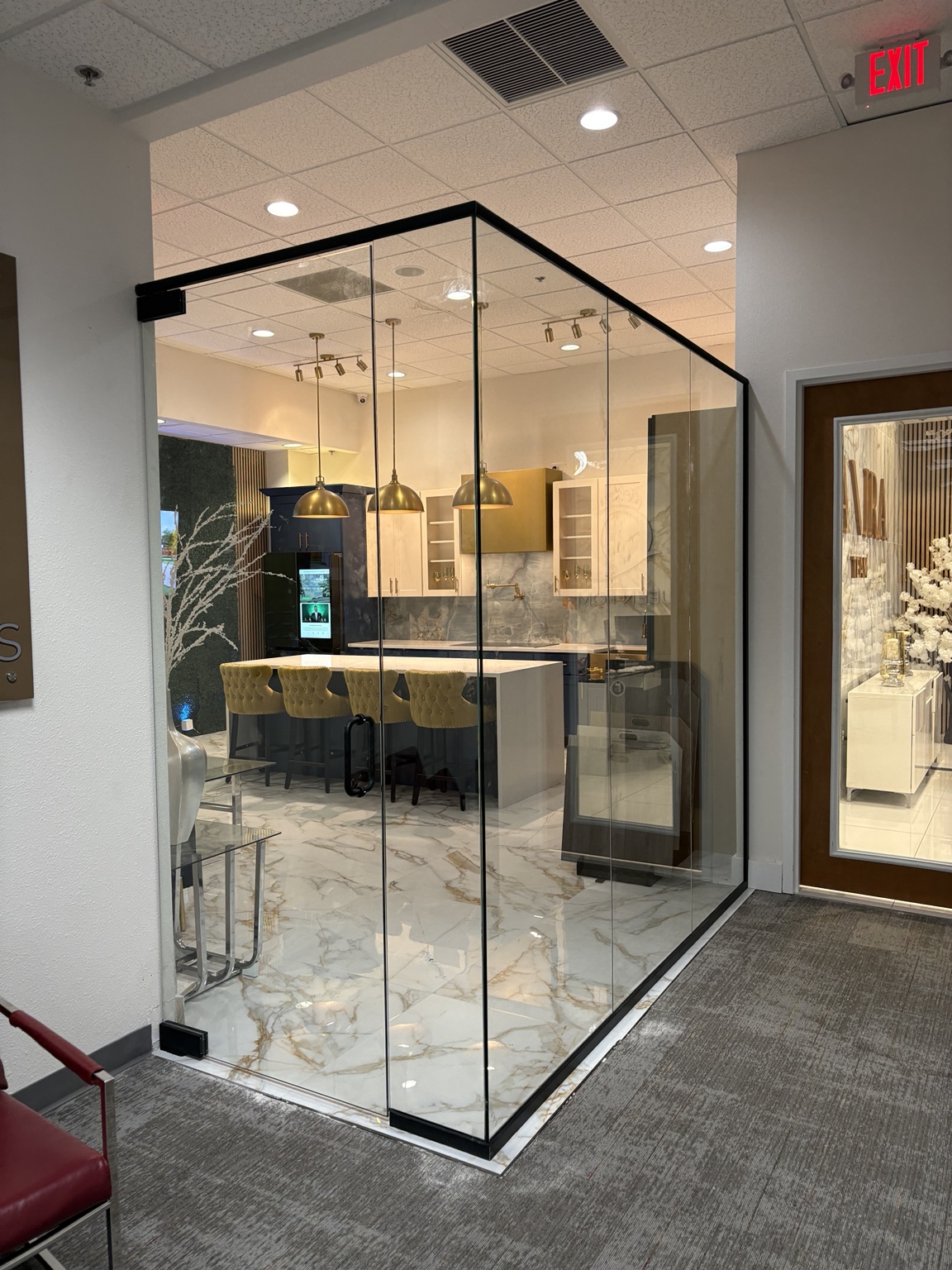 Next Glass custom frameless glass room with black hardware